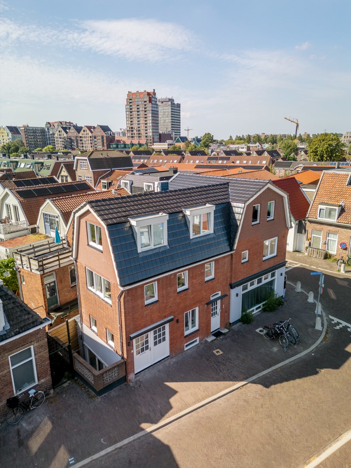 aerial view of a red brick corner building