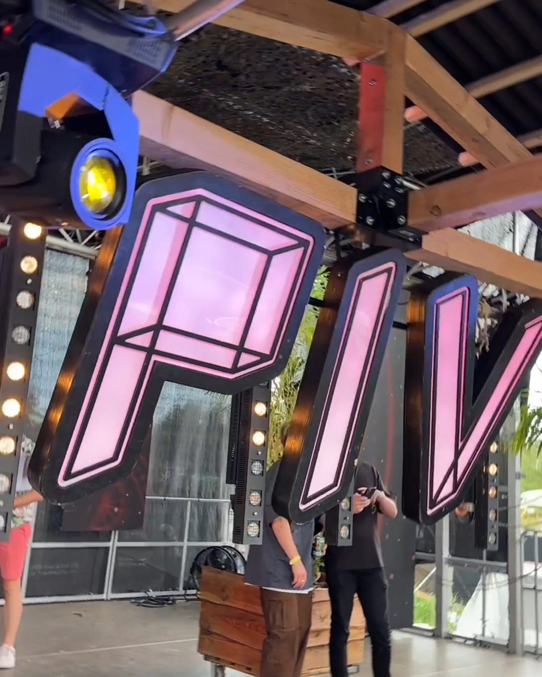 piv neon letters above the stage